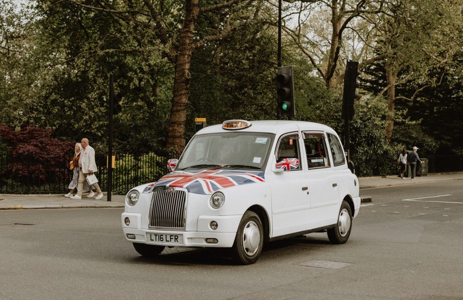 London Black Cab with Union Jack is an easy option to get around London with kids